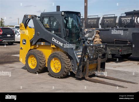 used skid steers alberta|skid steer attachments calgary.